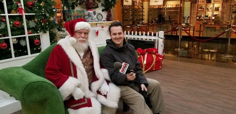 WBEN's Mike Baggerman with Santa Claus at Walden Galleria. December 19, 2019 (WBEN Photo/Kellie Scanlon)