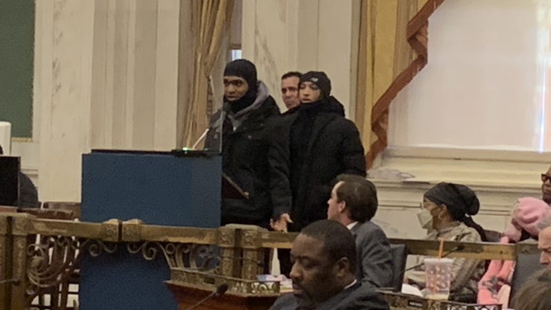 Saud Salahuddin (left) testifies before City Council in opposition to a bill that would ban ski masks in public places. The bill passed 11-2.