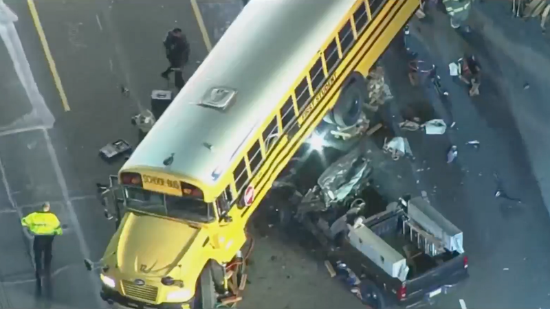 Pickup truck gets pinned under school bus in Montco crash, injuring student and driver
