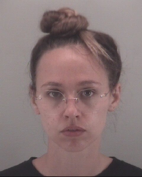 Richmond Police arrest twelve after unlawful assembly declared near Lee Monument late Sunday night. (Photo Credit: Richmond Police)