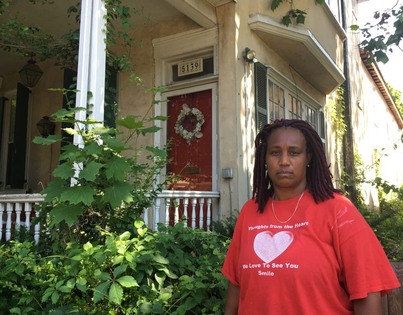 Lisa Scott stands in front of the historic Joseph T. Pearson house.