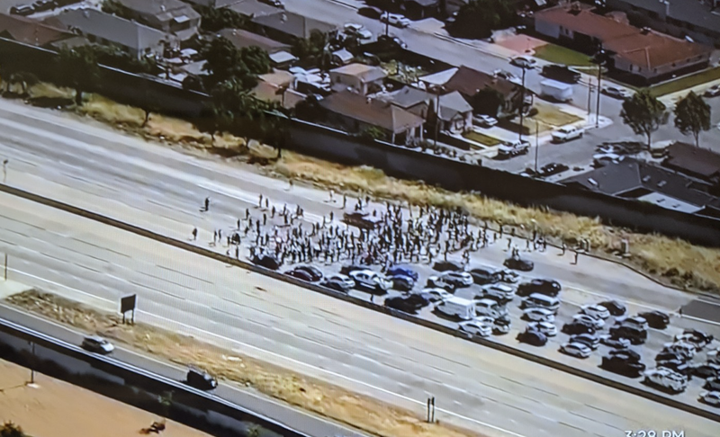 Protesters block traffic on Highway 101 in San Jose.
