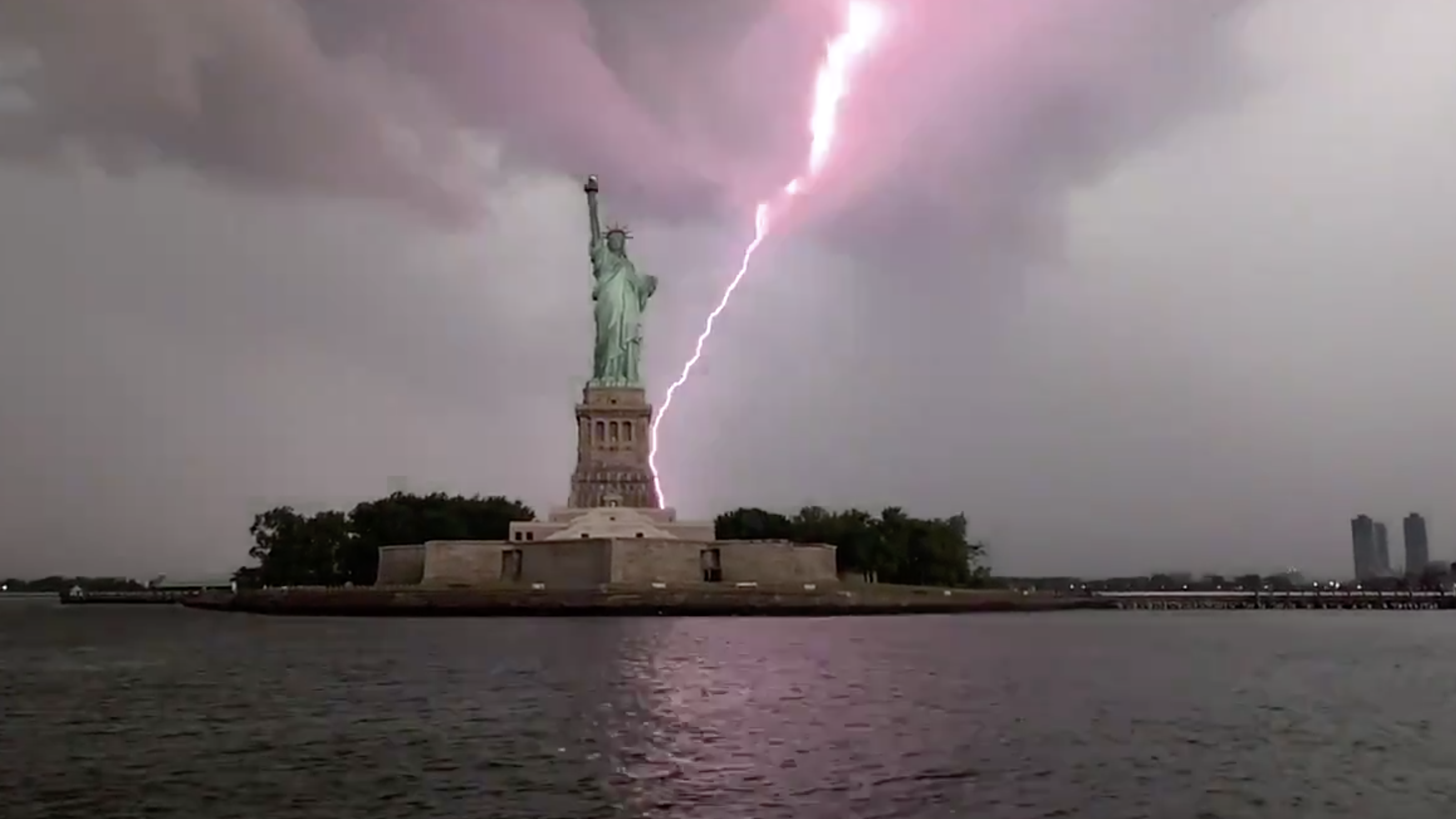 WATCH: Massive Lightning Bolt Strikes Statue of Liberty as Storm Passes Over NYC
