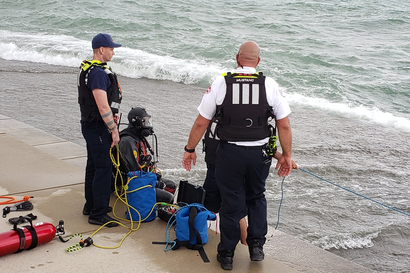 Divers Search For Teen At Diversey Harbor