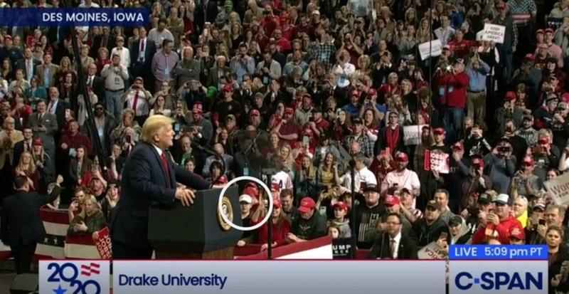 Kyle Rittenhouse (circled) can be seen wearing a white hat in the front row of a Trump rally in Des Moines, Iowa, Jan. 30. (CSPAN)