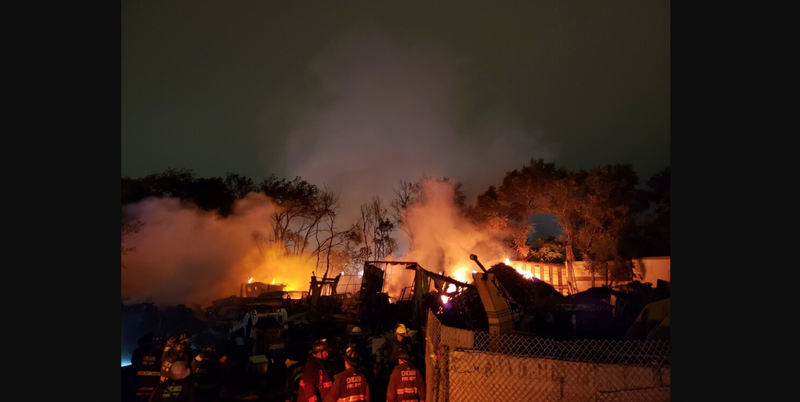 Crews battle 2-alarm fire at Austin scrap yard