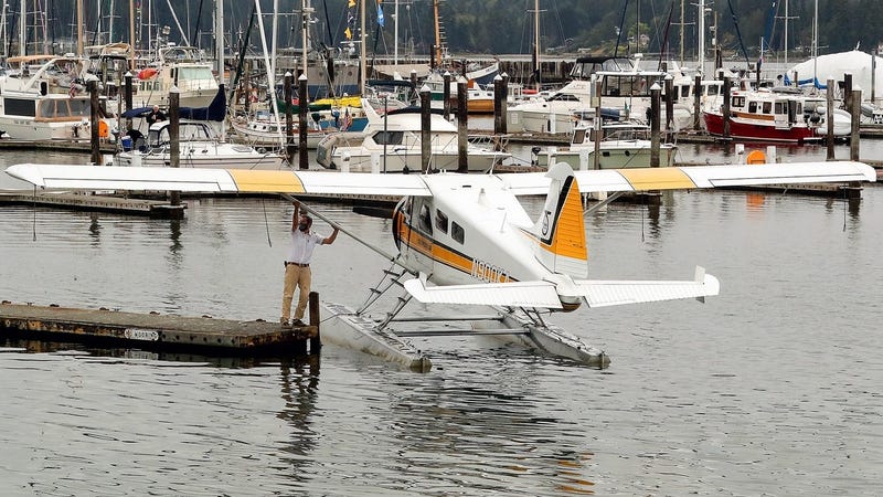 A Kenmore Air seaplane getting ready to leave the dock
