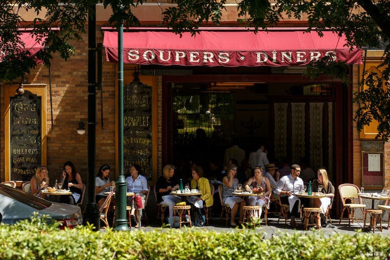 People sitting outdoors at a restaurant in Philadelphia. 