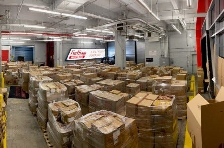 Boxes of counterfeit goods were seized from a storage facility in Hell's Kitchen