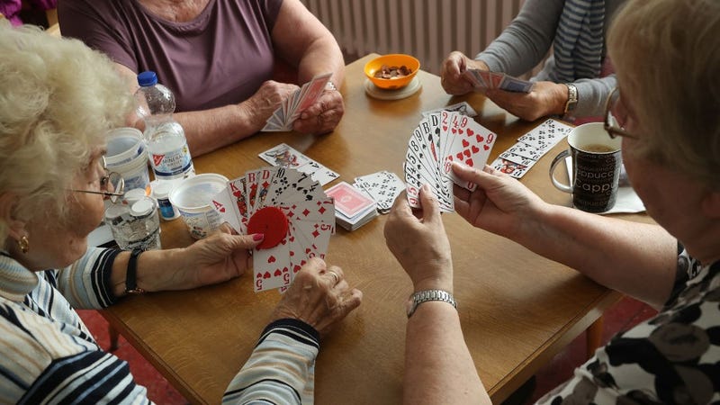 Elderly women play a cards game of rummy at the Mireille Mathieu senior citizens' center on September 20, 2017 in Berlin, Germany. 