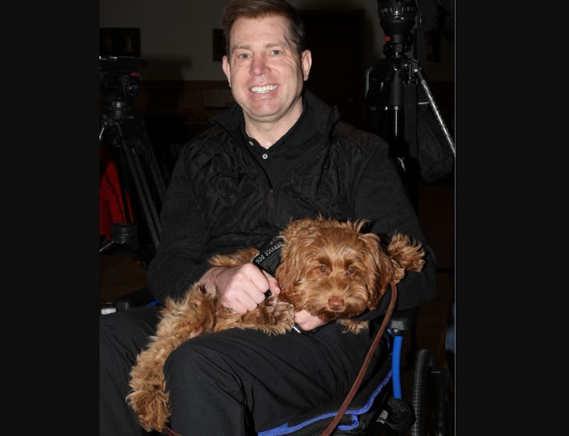 Nassau County Det. Ken Baribault with his new service dog, Lady, on Jan. 15, 2025.