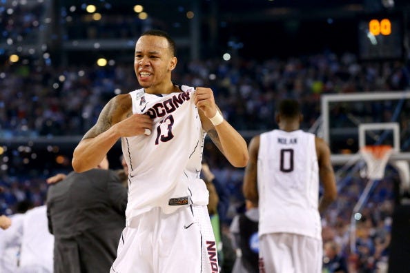 Shabazz Napier celebrates UConn winning the national title.