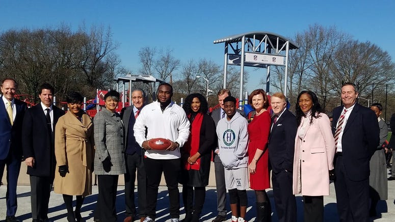 Shalise Steele Young (4th from left), widow of Atlanta City Council Ivory Young joined in the celebration of the J.F. Kennedy Park Improvement Project