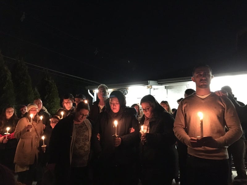 The family of Jerry Pastore lead a vigil for the owner of Shamrock Deli, in Audubon, Camden County.