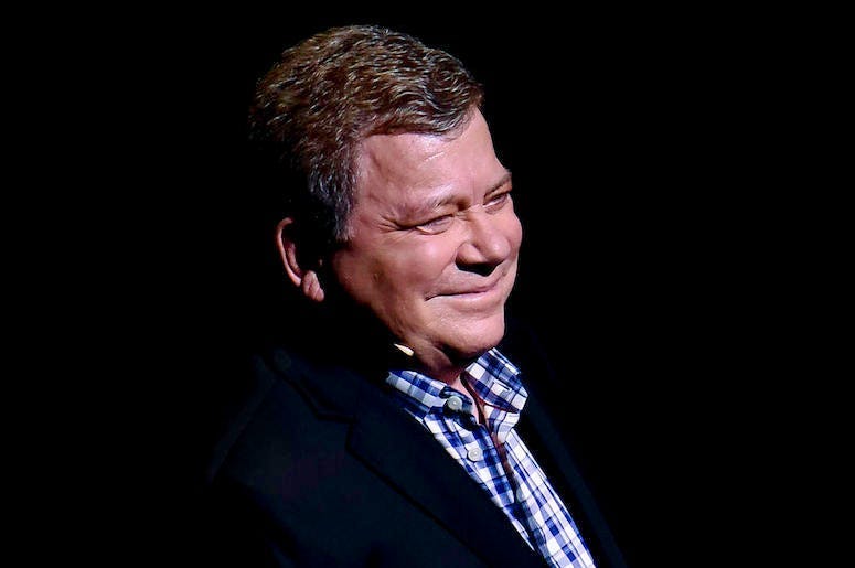 William Shatner smiling during conference