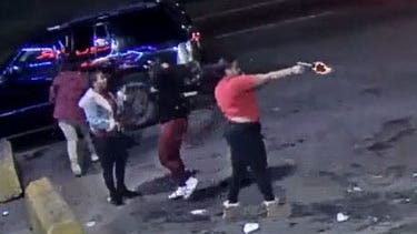Detroit police searching for female suspect in liquor store parking lot shooting [VIDEO]