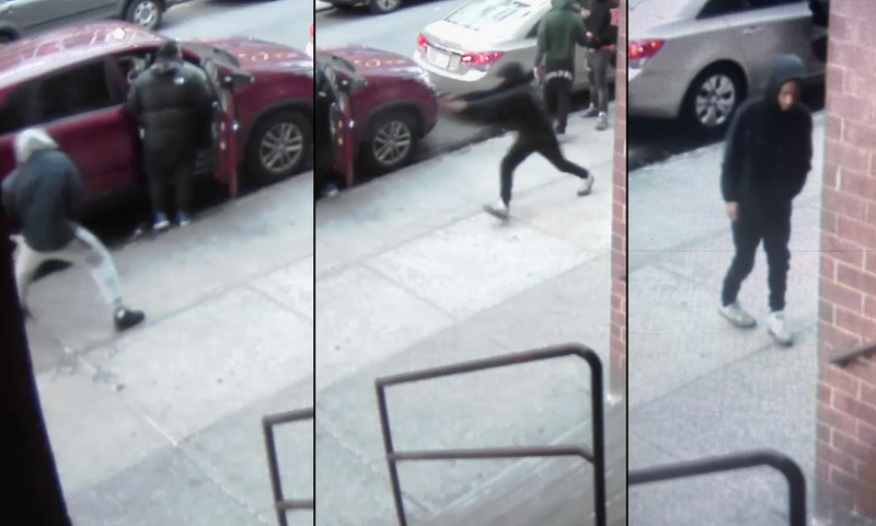 The shooter's face was obscured during the gunfire, but he appears to be the person of interest wanted for questioning by police
