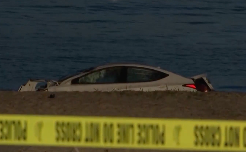 Police: Out-of-control car hits woman on bench, plunges into Delaware Bay