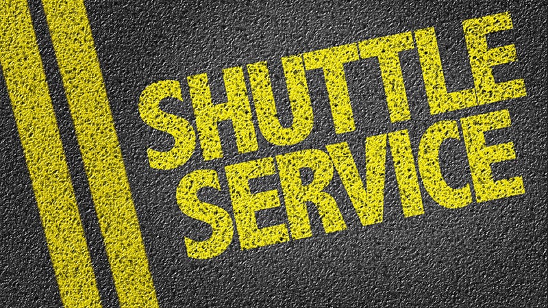 shuttle service painted on concrete