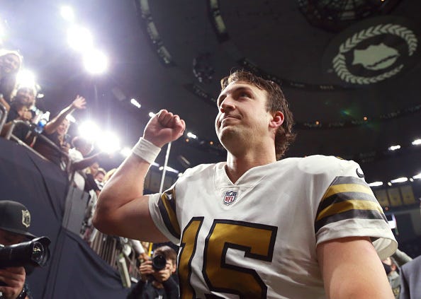 Trevor Siemian celebrates a Saints victory