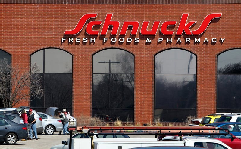 Customers shop at Schunks grocery store on Friday, March 29, 2013, in Kirkwood, Missouri.