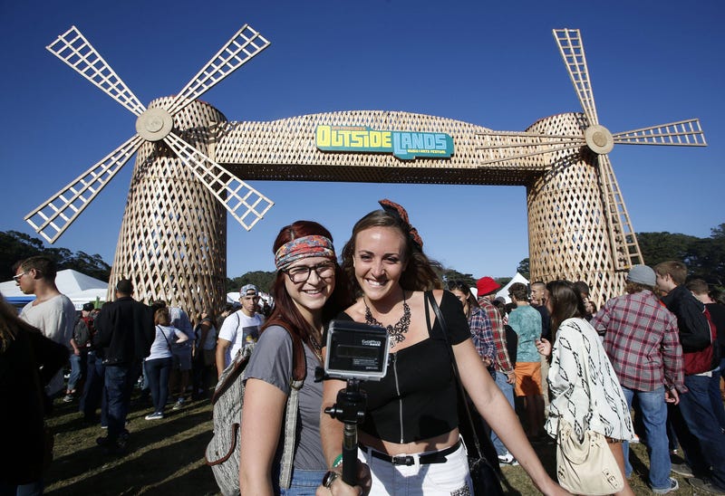 Claire Fabrocini, left, and Kim Horst, of Los Angeles, take a selfie with their GoPro camera during day one of the Outside Lands music festival at Golden Gate Park in San Francisco on August 8, 2014.