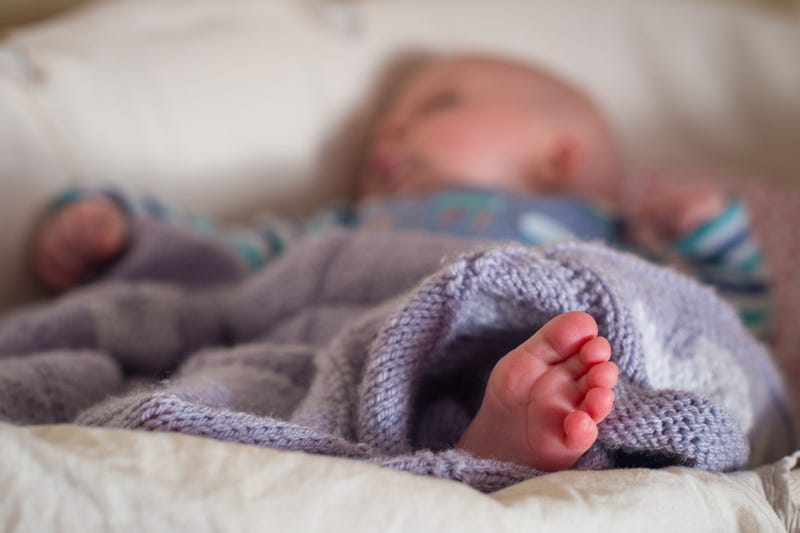 5/19/2017 - File photo dated 24/1/2016 of a baby sleeping in a basket. Getting babies to sleep well at night may halve their risk of obesity as toddlers, research suggests. (Photo by PA Images/Sipa USA)