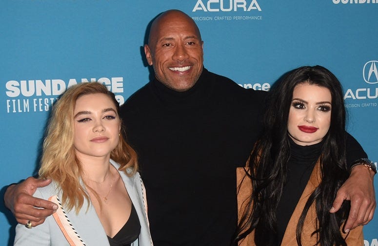 PARK CITY, UT - JANUARY 28: Dwayne Johnson, Florence Pugh, Paige, Saraya-Jade Bevis attends the Surprise Screening Of 'Fighting With My Family' during the 2019 Sundance Film Festival at The Ray on January 28, 2019 in Park City, Utah