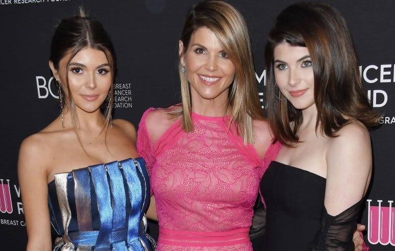 Caption: (L-R) Olivia Jade Giannulli, Lori Loughlin and Isabella Rose Giannulli at The Women's Cancer Research Fund's An Unforgettable Evening Benefit Gala held at the Beverly Wilshire Beverly Hills in Beverly Hills, CA on Thursday, February 28, 2019
