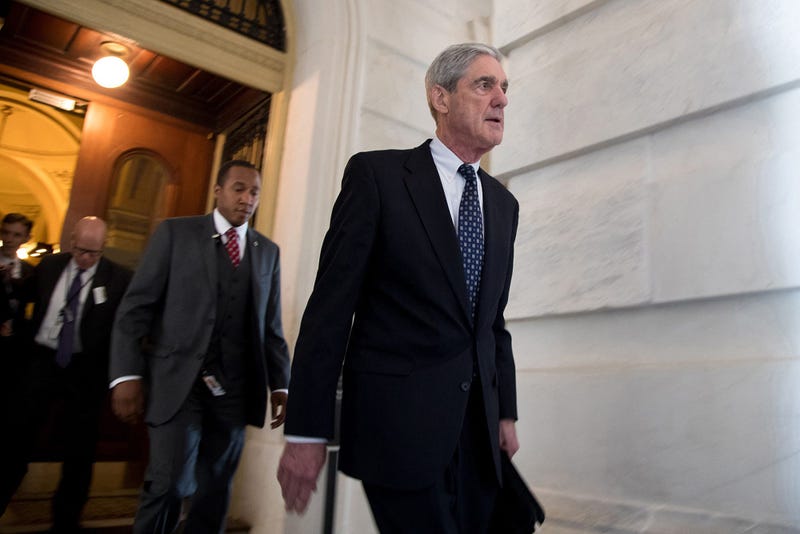 Former FBI Director Robert Mueller, front, the special counsel probing Russian interference in the 2016 U.S. election, leaves the Capitol building after meeting with the Senate Judiciary Committee on Capitol Hill on June 21, 2017, in Washington, D.C.