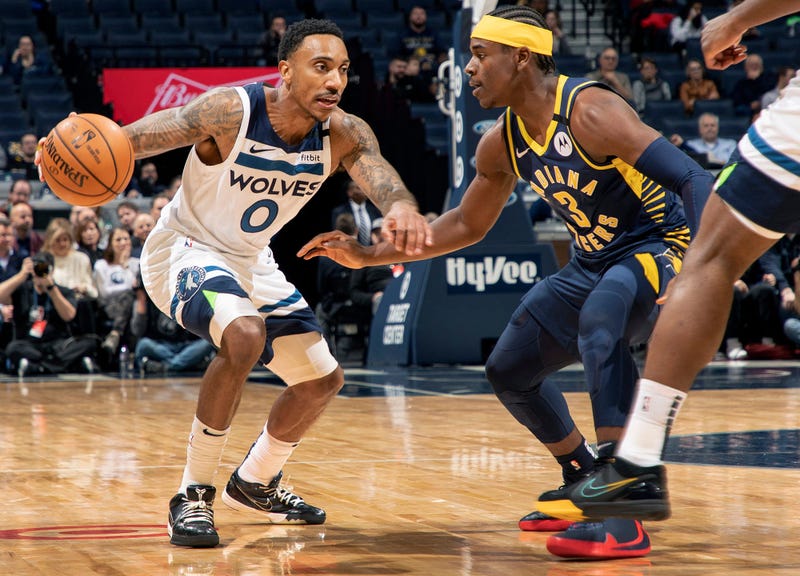 The Minnesota Timberwolves' Jeff Teague (0) works against the Indiana Pacers' Aaron Holiday (3) in the first half at Target Center in Minneapolis on Wednesday, Jan. 15, 2020