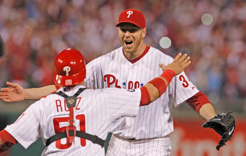 Philadelphia Phillies catcher Roy Halladay and catcher Carlos Ruiz celebrate a no-hitter, October 6, 2010.