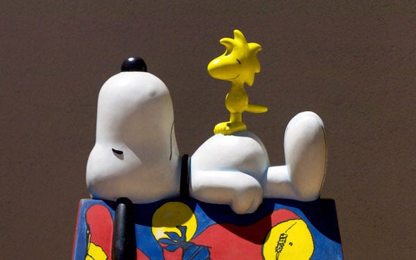 A large sculpture of "Peanuts" characters 'Snoopy' and 'Woodstock' can be seen outside the Charles M. Schulz Museum in Santa Rosa, California