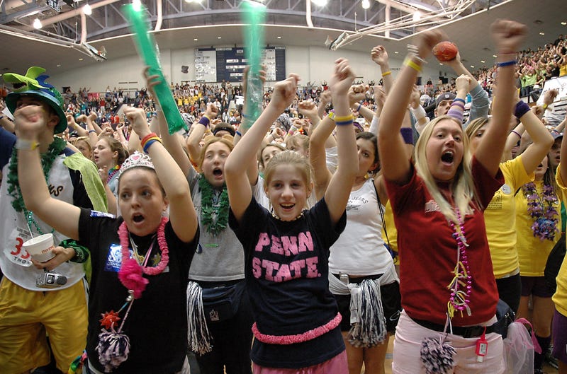 KESTERSON/PHILADELPHIA INQUIRER (February 21) Missy Lau, left, a 21-year-old senior, Lauren Maxham, center, 14, and her sister Diana Maxham, right, a 22 year-old senior dance a line dance during the Penn State "THON," a 48-hour dance marathon. (Photo by smd) 2005 (Diversity)