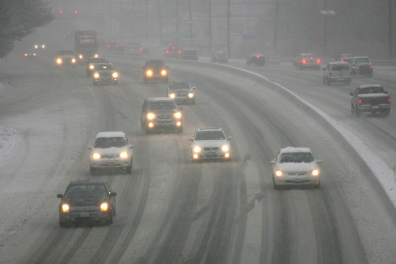 File photo: Snow falls in Woodridge, New Jersey