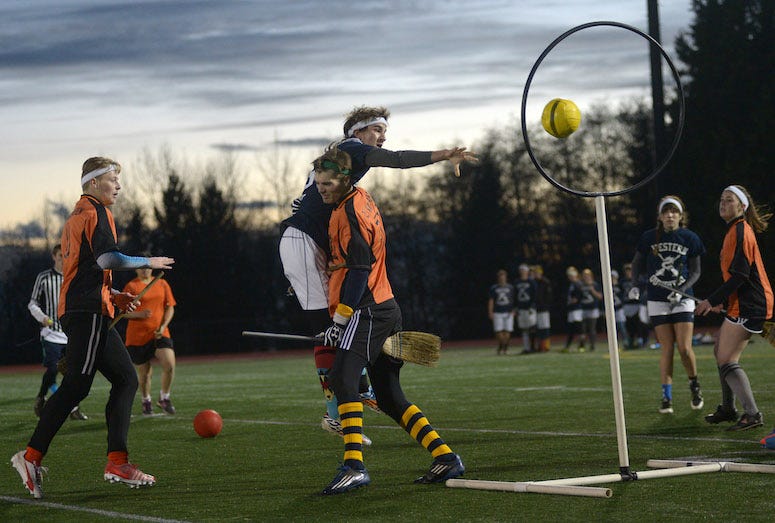 Adults playing Quidditch, 2014