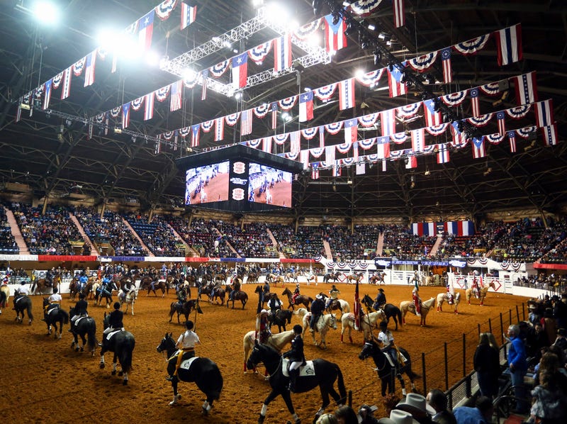 Riders participate in the Grand Entry at the Fort Worth Stock Show and Rodeo in Fort Worth, Texas, on Friday, Jan. 22, 2016.