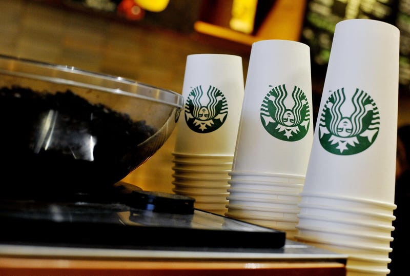 stack of Starbucks coffee cups