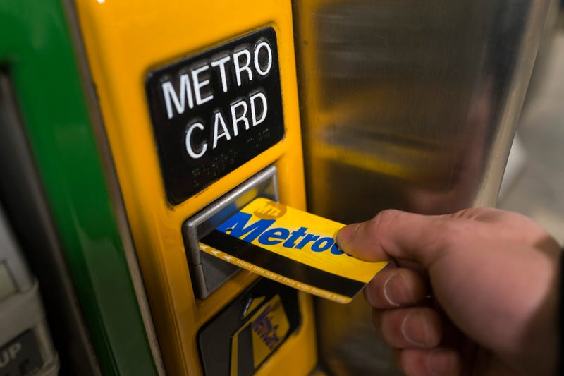 A passenger refills a MetroCard at a subway station in Manhattan