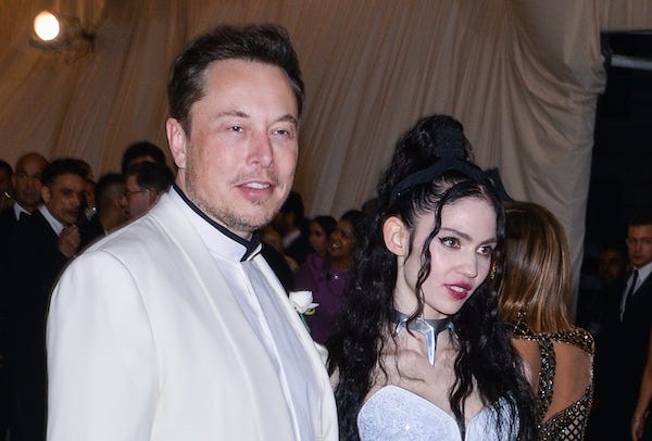 Elon Musk and Claire Elise Boucher aka Grimes walking on the red carpet at The Metropolitan Museum of Art Costume Institute Benefit