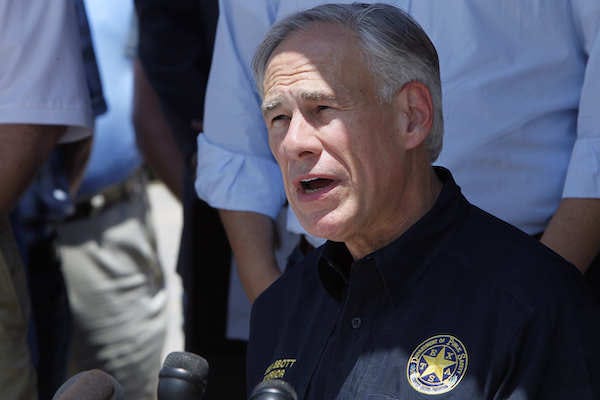 Texas Governor Greg Abbott speaks at a press briefing in Santa Fe, Texas