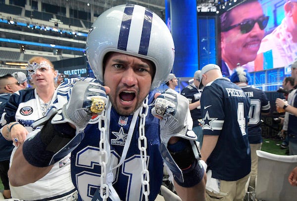 Dallas Cowboys fans on the floor waiting for the start of the 2018 NFL Draft at AT&T Stadium in Arlington, Texas, on Thursday, April 26, 2018