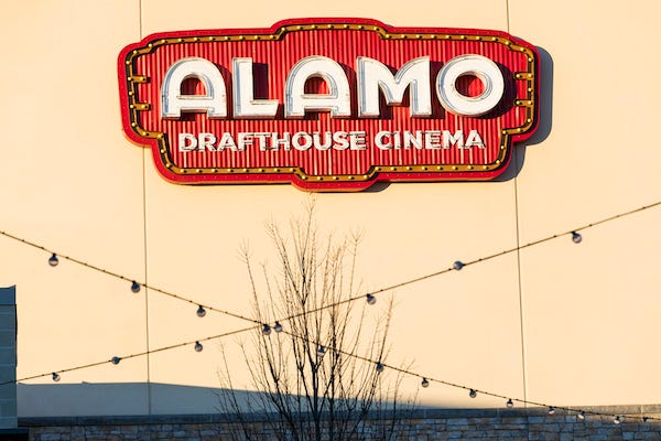 Alamo Drafthouse Cinema sign on a wall