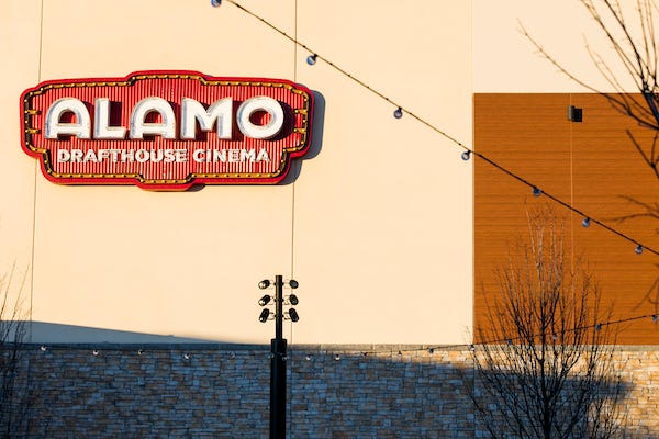 A logo sign outside of an Alamo Drafthouse Cinema location in Woodbridge, Virginia, on January 21, 2019