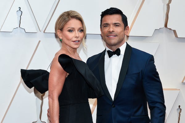 Kelly Ripa and Mark Consuelos walking on the red carpet at the 92nd Annual Academy Awards held at the Dolby Theatre in Hollywood, California on Feb. 9, 2020