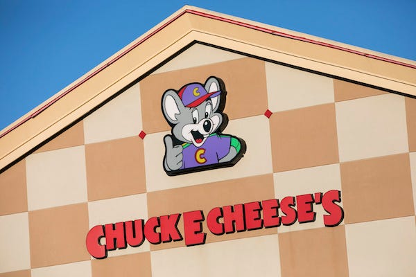 A logo sign outside of a Chuck E. Cheese restaurant location in Waldorf, Maryland, on February 27, 2020