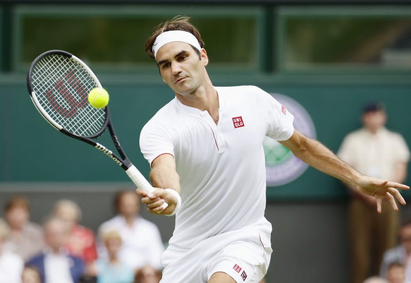 Photo taken July 4, 2018, shows Roger Federer of Switzerland playing against Lukas Lacko of Slovakia in the second round of the Wimbledon tennis tournament in London. (Photo by Kyodo News/Sipa USA)