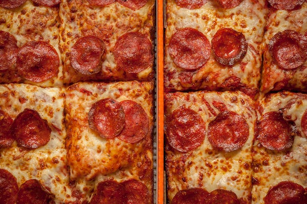 Pepperoni slices of Detroit style deep dish pizza, part of the Lunch Combo at a Little Caesars franchise