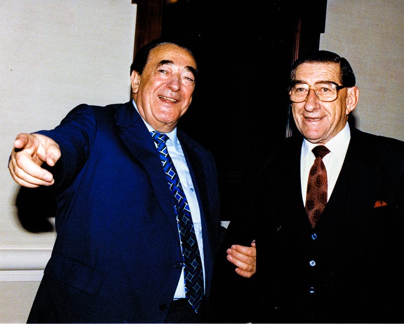 In this file photo from September 25, 1990, disgraced publisher Robert Maxwell, left, meets South African Ambassador to the United States.v