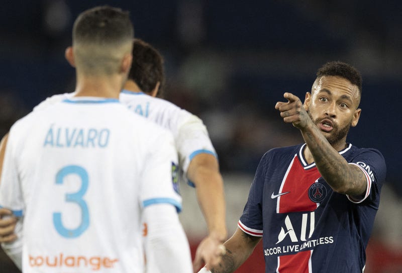 PSG's Neymar Jr and OM's Alvaro Gonzalez Soberon argue during the Ligue 1 match between Paris Saint Germain and Olympique de Marseille at Parc des Princes, on September 13, 2020 in Paris, France. Neymar was sent off on his return from Covid-19 quarantine after reacting to an alleged racist slur as Marseille snapped their 20-match winless run against Paris Saint-Germain with a 1-0 victory over the reigning Ligue 1 champions on Sunday. Neymar, in his first game since testing positive for coronavirus last week, was dismissed in injury time for a slap on Marseille defender Alvaro Gonzalez. The Brazilian appeared to accuse his opponent of racism as he followed red-carded teammates Layvin Kurzawa and Leandro Paredes down the tunnel after he was sent off following a VAR review.